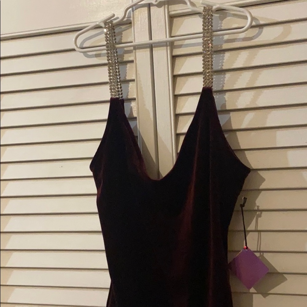 Burgundy velvet bodysuit with diamond straps